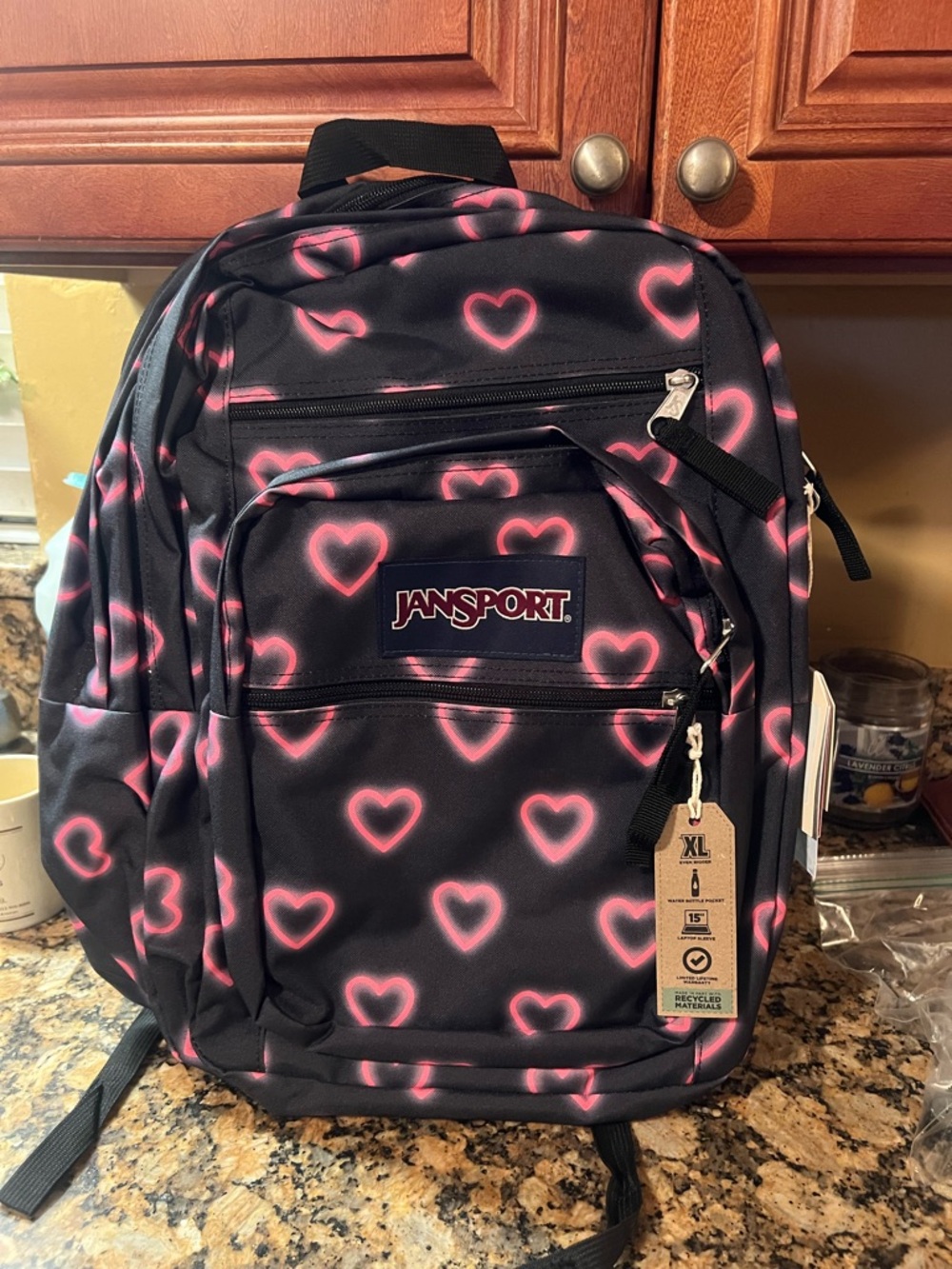 Jansport Black Backpack with Pink Heart Print